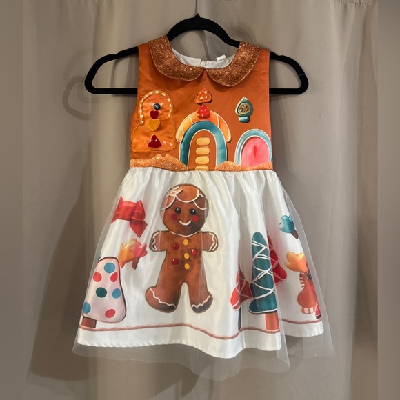 Kids Festive Gingerbread Dress with Orange and White Accents - Picture 1 of 6